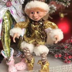 Cute posable elf (like high-end Elf on a shelf)